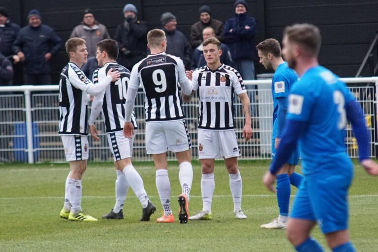 Moors celebrate McKenna's opening goal.