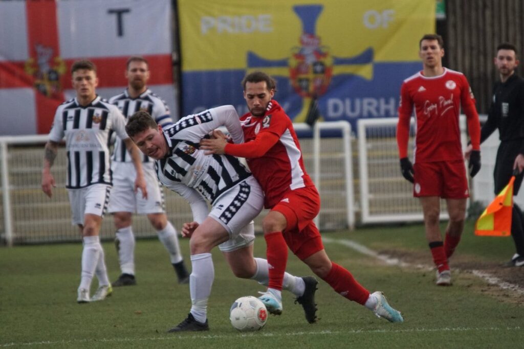 Shane Henry battles with Ellis Myles