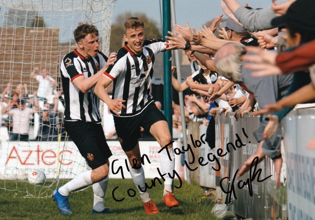 A signed print of Glen Taylor scoring the winner vs Chorley