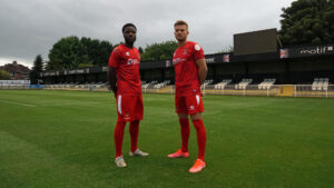 Jude Oyibo and Jordan Thewlis model the Spennymoor Town away shirt for 2022/23