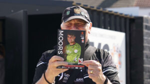 A Spennymoor Town fan with the Match Programme