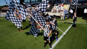 Spennymoor Town flag bearers at the Telford game