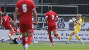 Spennymoor Town forward Jordan Thewlis scores at Hereford