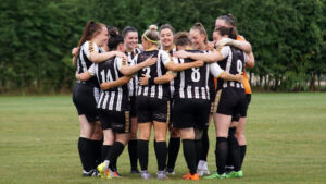 Spennymoor Town Ladies Team in a pre-match huddle