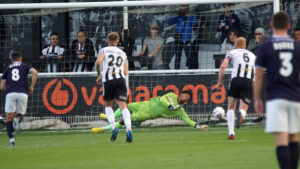 Gio Bellagambi saves a penalty for Spennymoor Town against Buxton