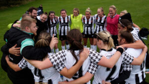 Spennymoor Town Ladies in a post-match huddle