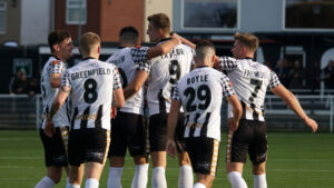 Spennymoor Town players celebrate after a goal
