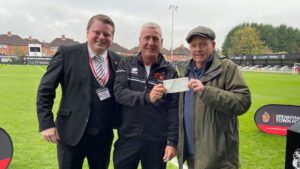 Ian Geldard and Mark Sleightholme accept the cheque from John McGill