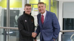 New Spennymoor Town signing Lewis Thompson with boss Jason Ainsley