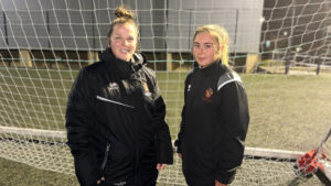 Spennymoor Town Ladies skipper Alex Saunders (left) welcomes Lily Walker to the Club