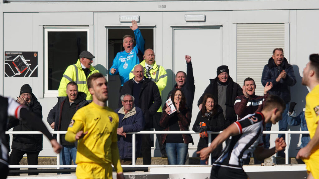 David Leitch celebrating in the stand