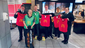 Luke Cowie from Moors in the Community with staff from McDonald's