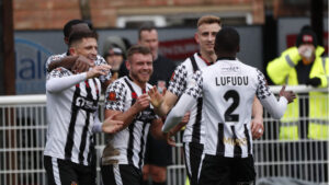 Spennymoor Town players celebrate a goal against Chorley