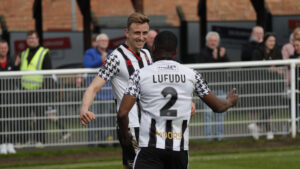 Spennymoor Town's Glen Taylor and John Lufudu celebrate a goal