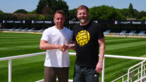 Spennymoor Town midfielder Mark Anderson with Assistant Manager Lewis Dickman