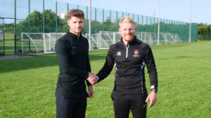 Josh Doherty with Spennymoor Town Manager Jamie Chandler