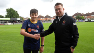 Twelfth Man Jacob Dean with Spennymoor Town's Commercial Manager Paul Cockburn