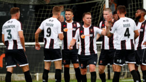 Spennymoor Town players celebrate a goal against Newcastle United Under-21s