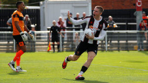 Spennymoor Town striker Will Harris celebrates his goal against Tamworth