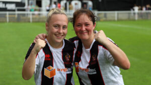 Spennymoor Town Ladies players Hannah Knox and Shannon Reed celebrate victory over Hull United
