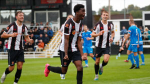 Joshua Popoola celebrates his goal for Spennymoor Town against Marine