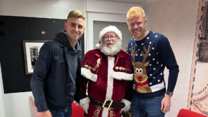 Spennymoor Town players Glen Taylor and James Curtis with Santa Claus