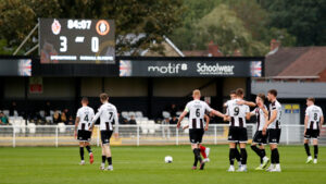 Spennymoor Town players celebrate the third goal against Rushall Olympic