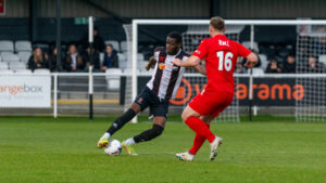Lebrun Mbeka in action for Spennymoor Town against Brackley Town