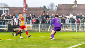 Spennymoor Town midfielder Rob Ramshaw scores against Blyth Spartans