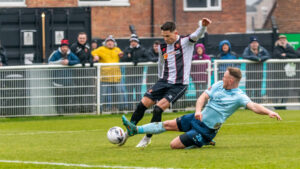 Spennymoor Town midfielder Rob Ramshaw fires home his goal against Darlington