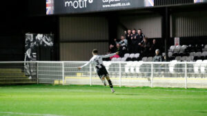 Spennymoor Town defender Reece Staunton celebrates his goal against Warrington Town