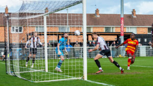 Spennymoor Town striker Glen Taylor scores against Gloucester City