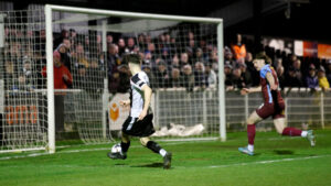 Spennymoor Town winger Corey McKeown scores the winning goal against Scunthorpe United