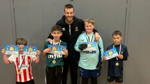 Spennymoor Town's Matty Arnell with youngsters at Moors in the Community Holiday Camps