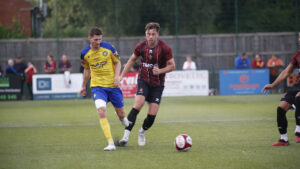 Spennymoor Town defender Reece Staunton in action at Stockton Town