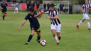 Spennymoor Town midfielder John Howard in action at Marske United