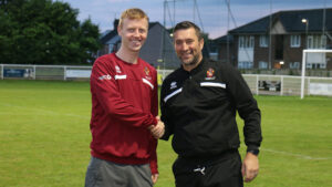 New Spennymoor Town signing Nathan McGinley with boss Graeme Lee