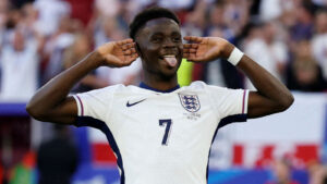 Bakayo Saka celebrating for England