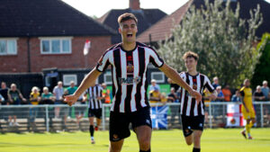 Spennymoor Town midfielder Isaac Fletcher celebrates a goal against Chester