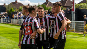 Spennymoor Town players celebrate a goal against Chester