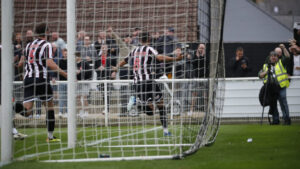 Spennymoor Town midfielder Isaac Fletcher celebrates his goal against Brackley Town