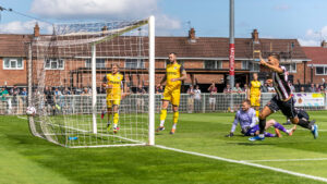 Spennymoor Town midfielder Isaac Fletcher scores against Chester