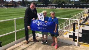 Spennymoor Town's Managing Director Ian Geldard with Carter and his friend at The Brewery Field