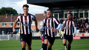 Spennymoor Town midfielder Isaac Fletcher celebrates his goal against Chorley