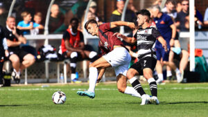 Spennymoor Town midfielder Isaac Fletcher in action against Darlington