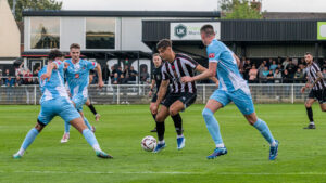 Spennymoor Town midfielder Isaac Fletcher in action against Morpeth Town