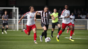 Spennymoor Town midfielder Rob Ramshaw in action against Hereford