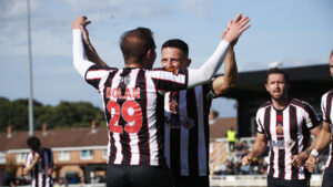 Spennymoor Town midfielders Matty Dolan and Rob Ramshaw celebrate a goal against Morpeth Town