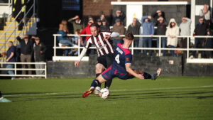 Spennymoor Town midfielder Matty Dolan scores a goal against Chorley