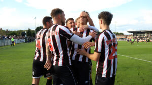 Spennymoor Town players celebrate the winning goal against Chorley